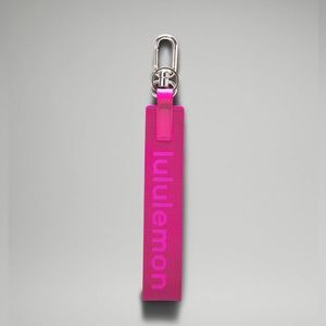 NWT lululemon never lost keychain sonic pink